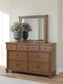 Rowlenstown California King Poster Bed with Mirrored Dresser and Nightstand