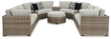 Load image into Gallery viewer, Calworth Outdoor 9-Piece Sectional with Ottoman
