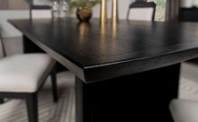 Load image into Gallery viewer, Brookmead Rectangular Dining Table with 18&quot; Removable Extension Leaf Black
